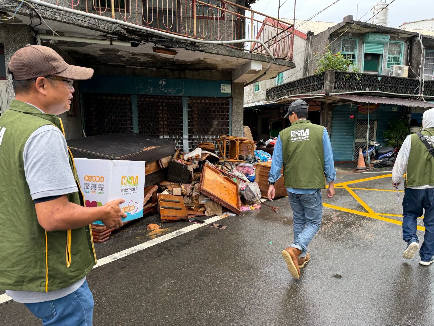 MSM relief team distributing essential supplies to affected families