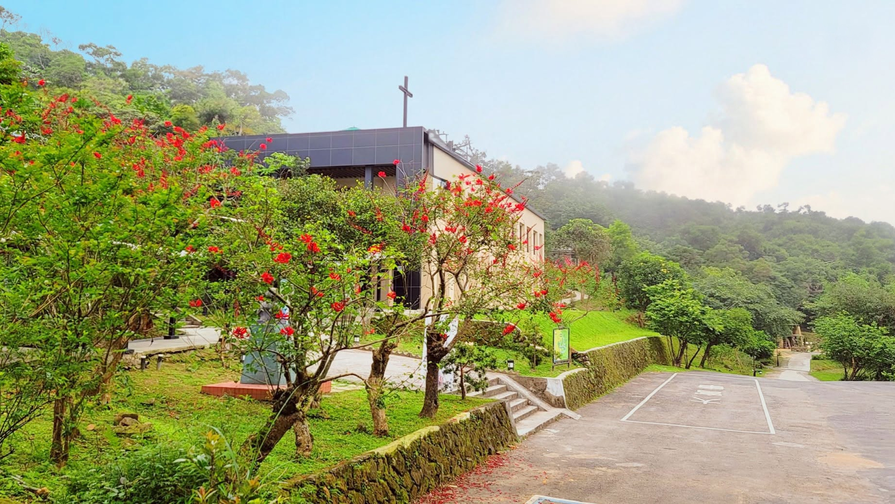 Illustrated Lillian Dickson Conference Ground with a yellow-roof retreat, green hillside, children, and the Pacific Ocean.