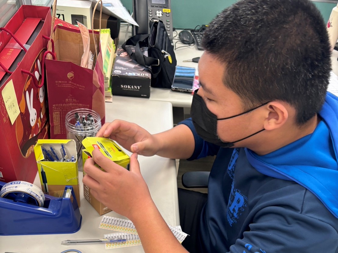 阿銘參與志工服務